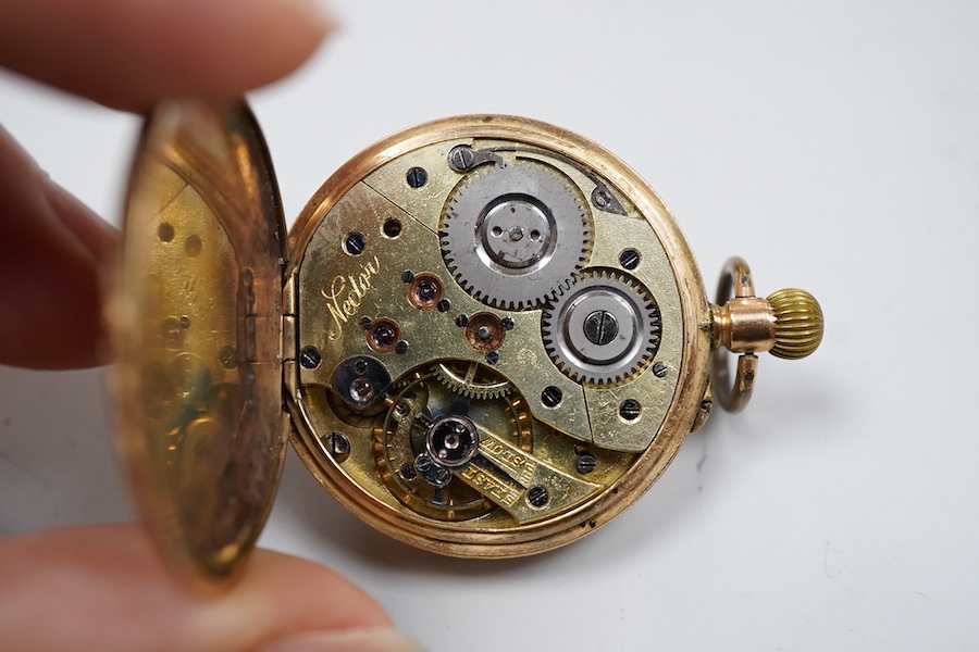 A lady's early 20th century 14K open faced fob watch, with Roman dial and gilt metal dust cover, gross weight 36 grams (dial cracked).